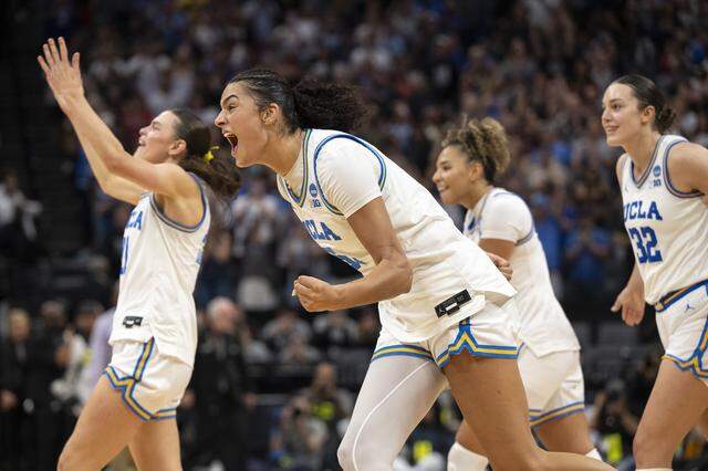 UCLA guard Gabriela Jaquez (11), UCLA guard Kiki Rice (1), UCLA forward Angela Dugalić (32), and UCLA center Lauren Betts (51) react after winning the Sacramento Regional 2 as a part of the March Madness tournament at Golden 1 Center in Sacramento on Sunday, March 29, 2026.
